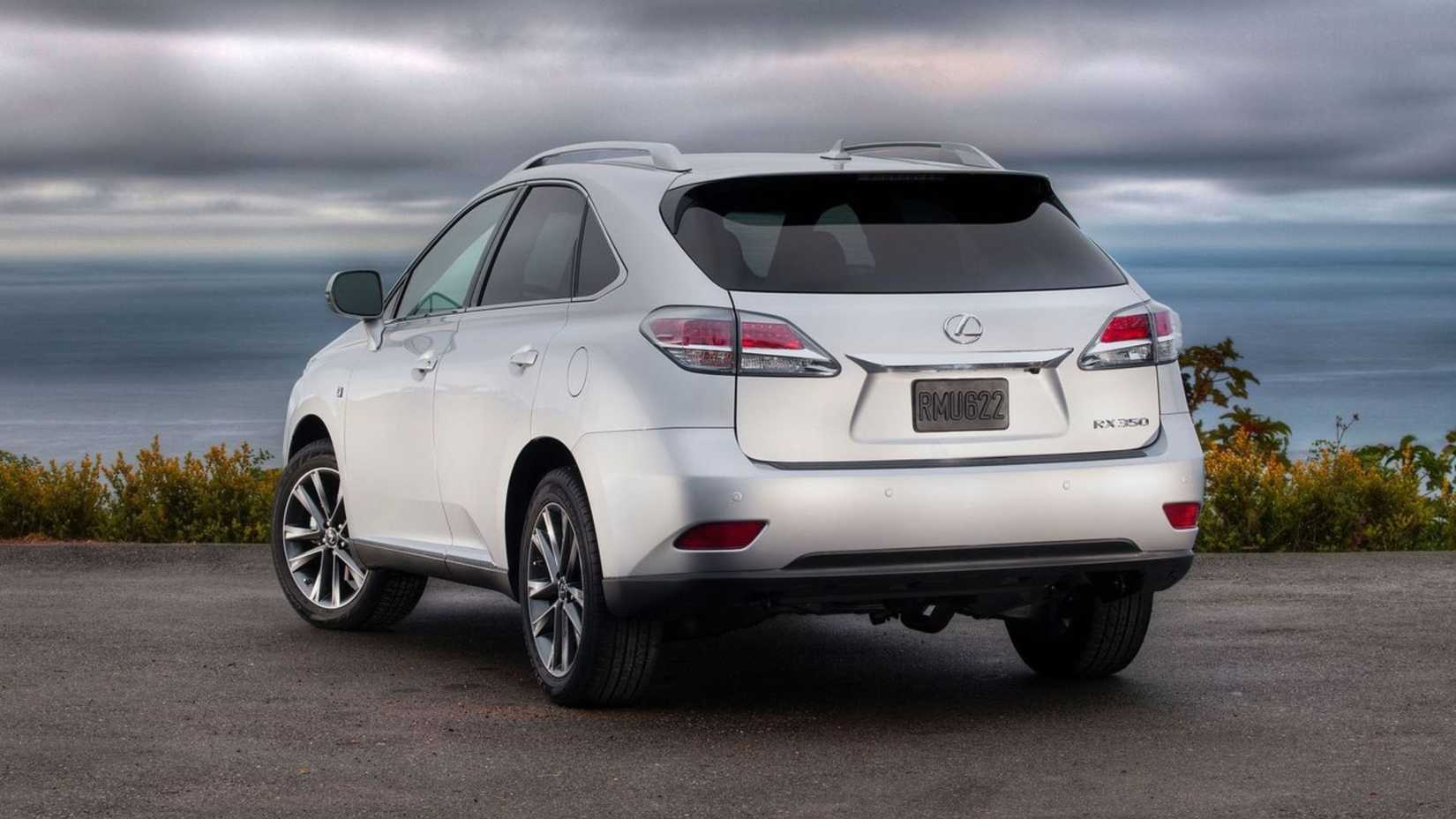 Static rear 3/4 shot of a silver 2013 Lexus RX 350 F Sport.