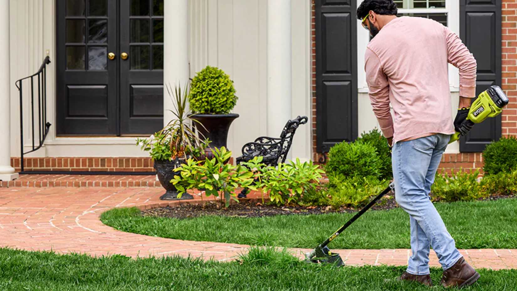 Man using Ryobi's new string trimmer