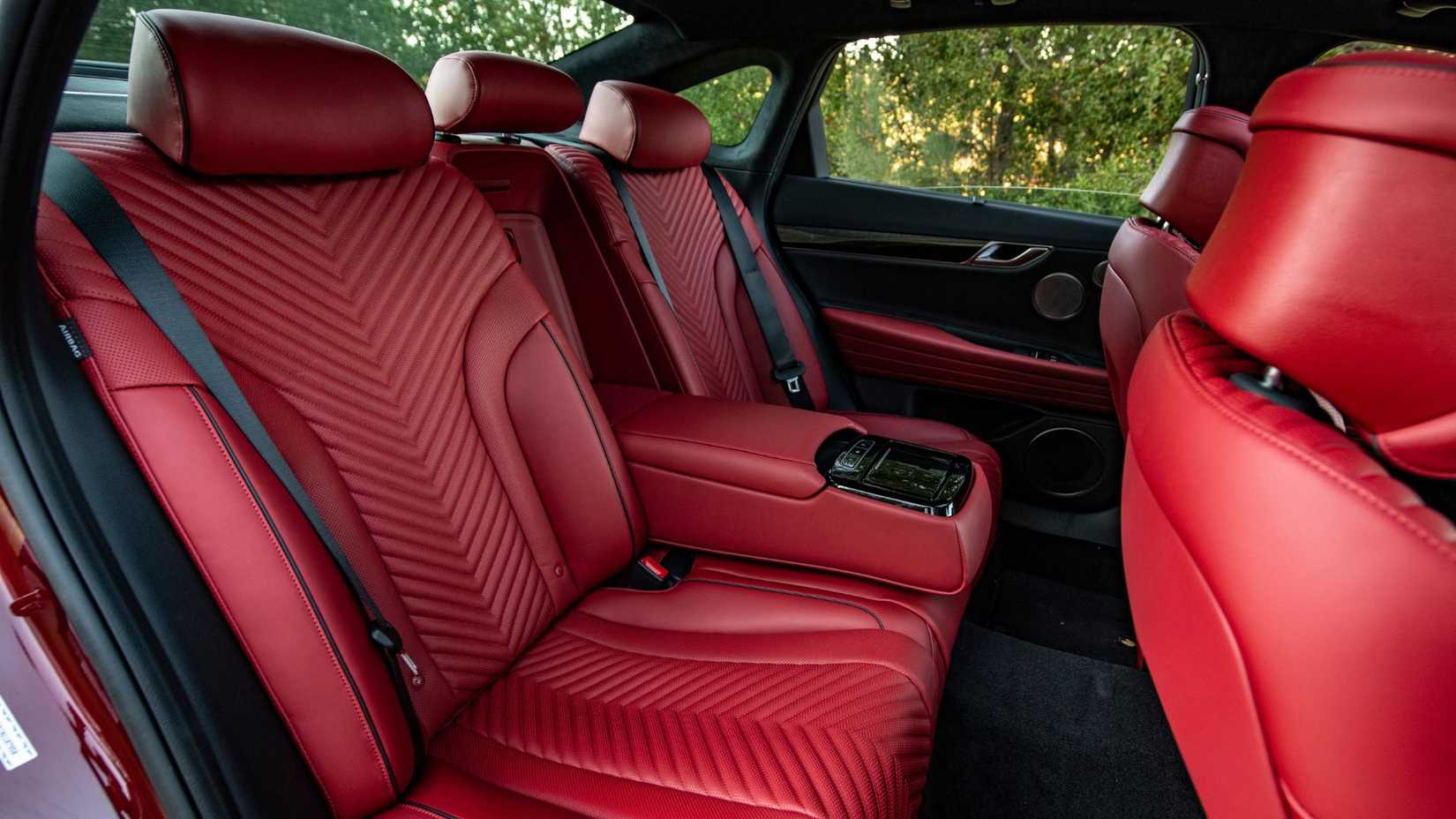 Shot of the red leather seats in the rear of a 2025 Genesis G80.