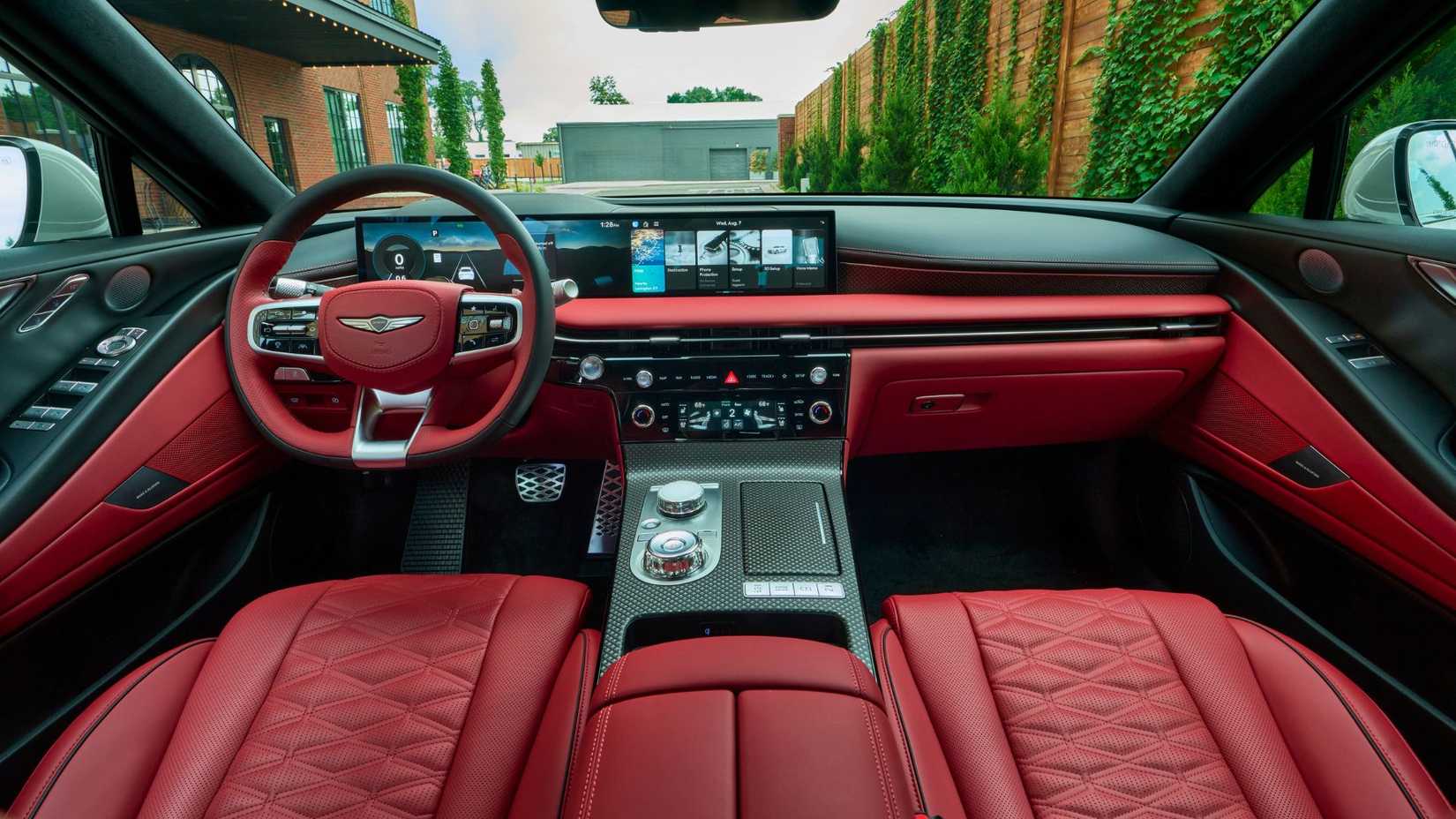 A shot of the dashboard and red leather interior of the 2025 Genesis G80.
