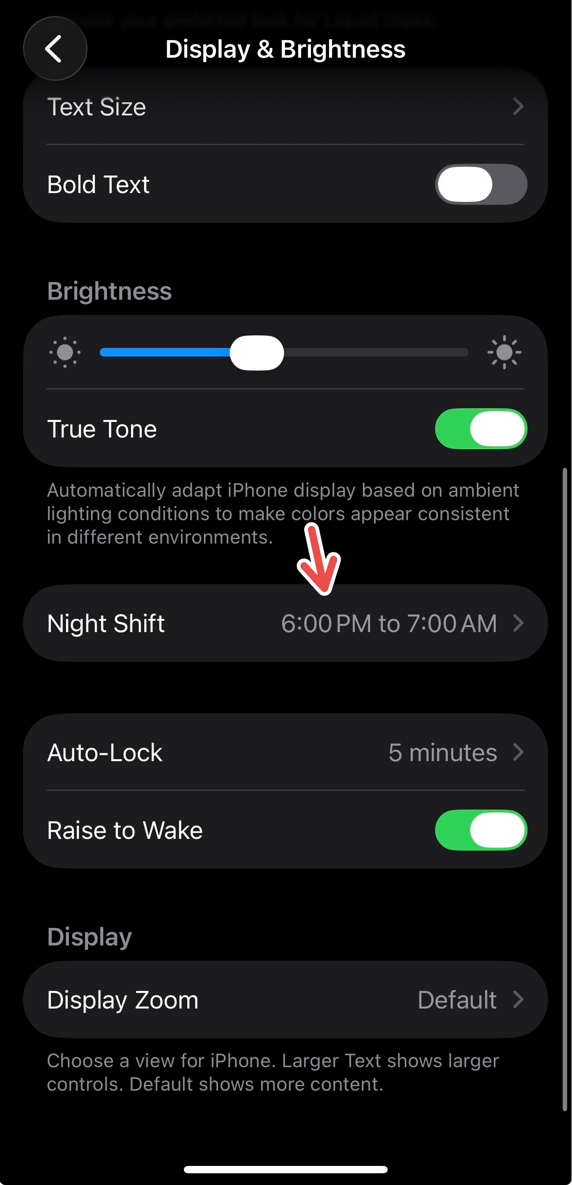 An iPhone screenshot with a red arrow pointing to