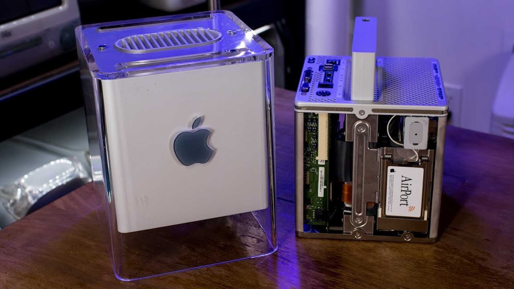 A Power Mac G4 Cube sitting on a table. 