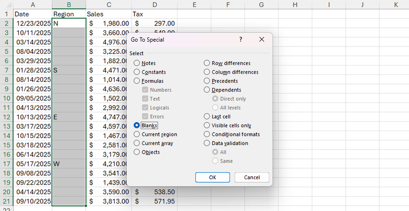 Some cells in a Region column in an Excel sheet are selected, and Blanks in the Go To Special dialog is checked.