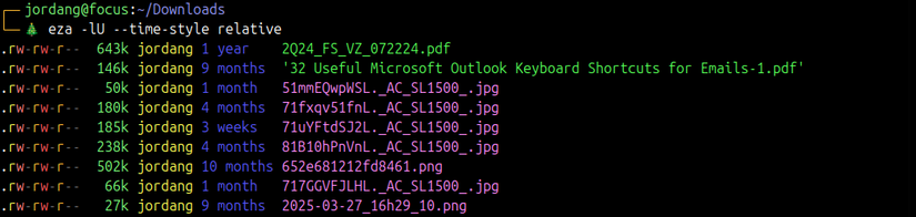 eza command with enhanced view, creation date and time style options showing output with relative dates.