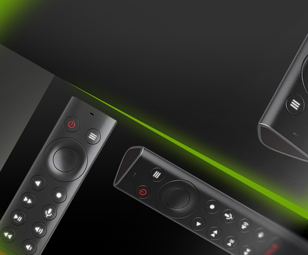 Three streaming remote controls over a dark background with a green glowing edge. (1)