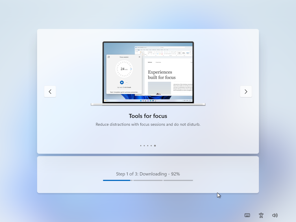 Windows 11 setup downloading content.