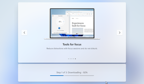 Windows 11 setup downloading content.