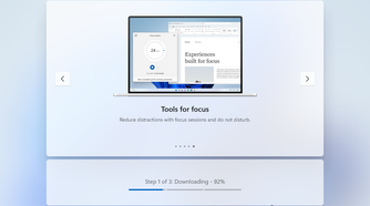Windows 11 setup downloading content.