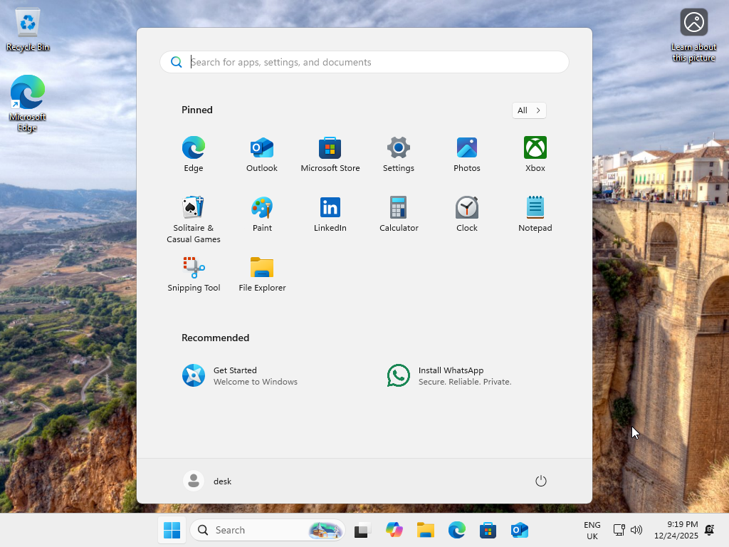 Windows 11 shows an ad for WhatsApp.