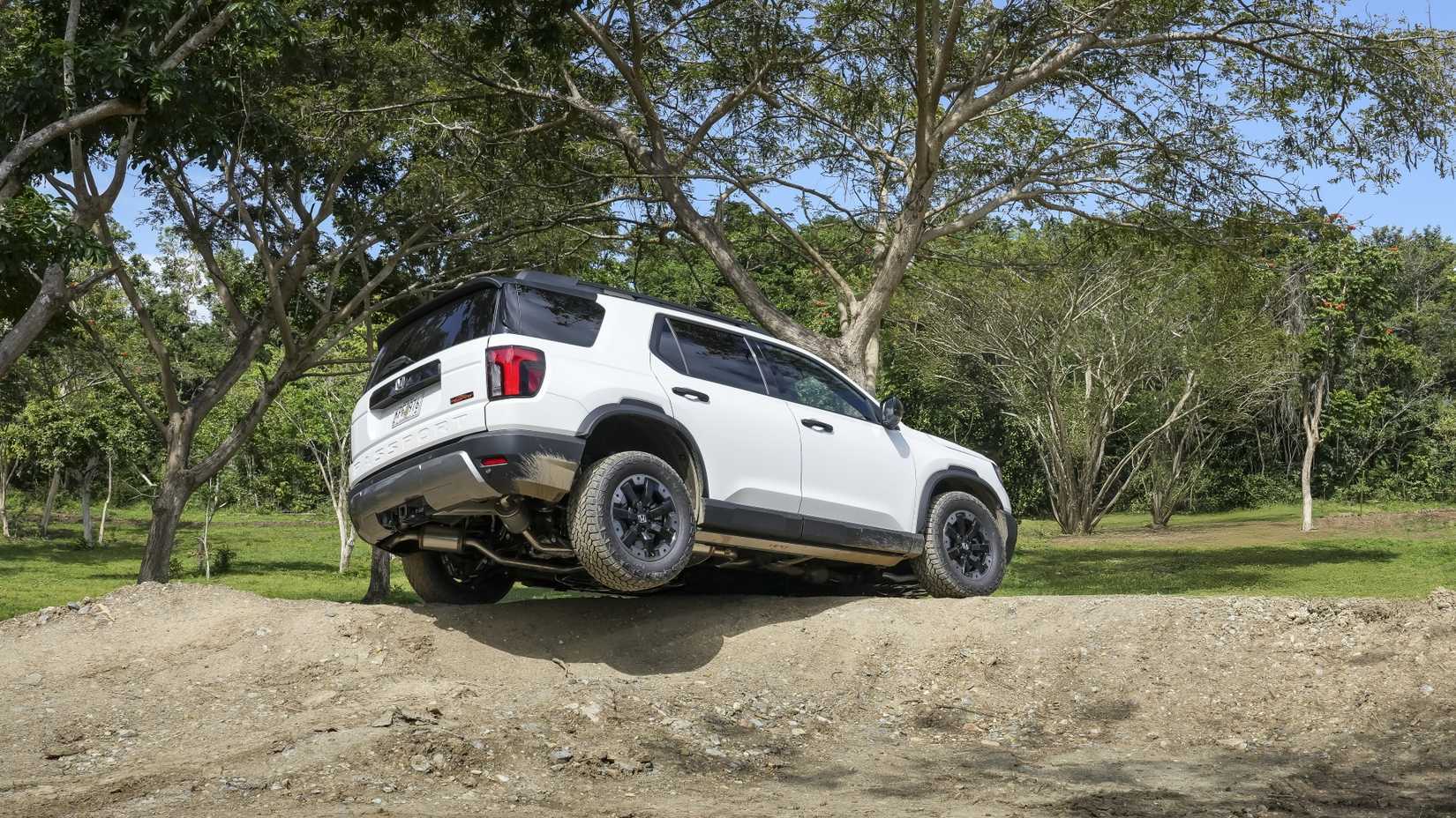 Rear 3/4 shot of a 2026 Honda Passport TrailSport Elite