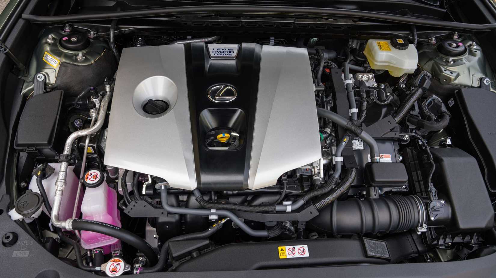 Close-up shot of the engine under the hood of a 2019 Lexus ES 300h.