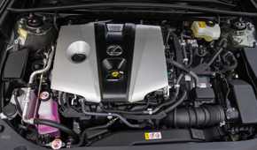 Close-up shot of the engine under the hood of a 2019 Lexus ES 300h.