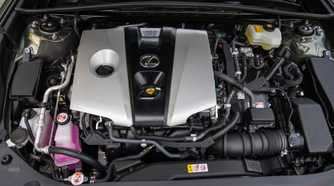 Close-up shot of the engine under the hood of a 2019 Lexus ES 300h.