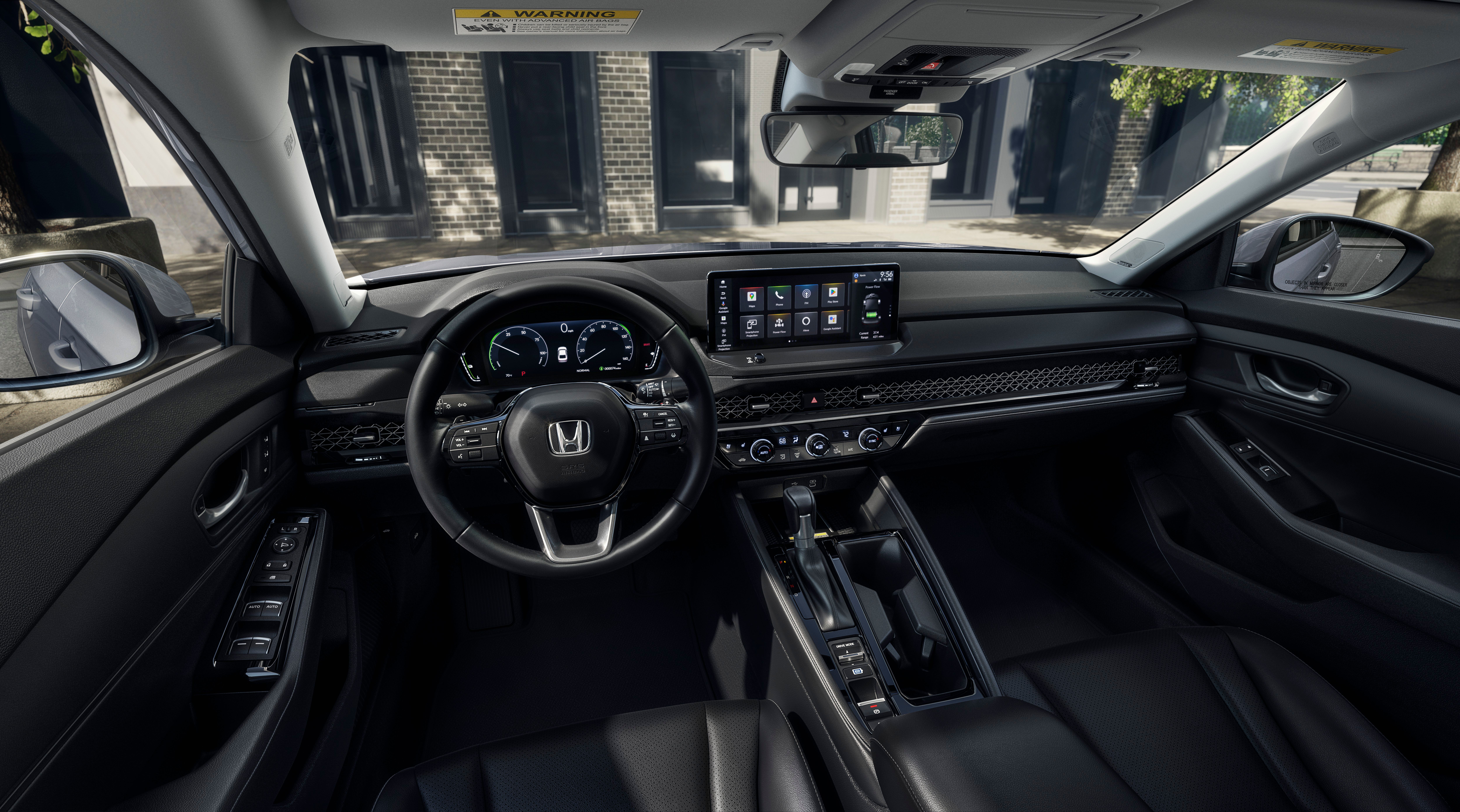 2026 Honda Accord Tourning interior array showing center console, steering wheel, and infotainment screen.