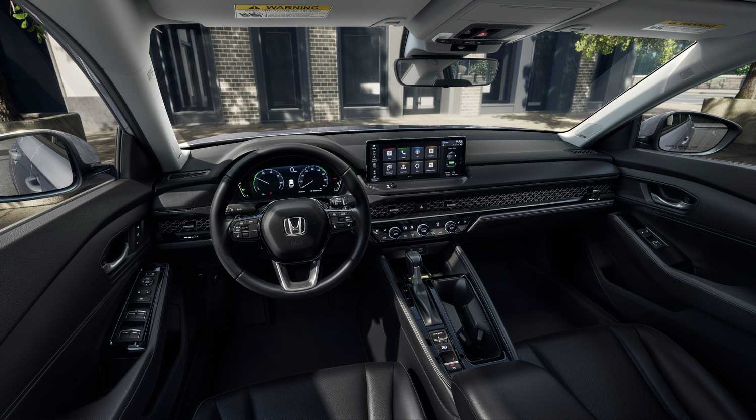 2026 Honda Accord Tourning interior array showing center console, steering wheel, and infotainment screen.