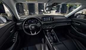2026 Honda Accord Tourning interior array showing center console, steering wheel, and infotainment screen.