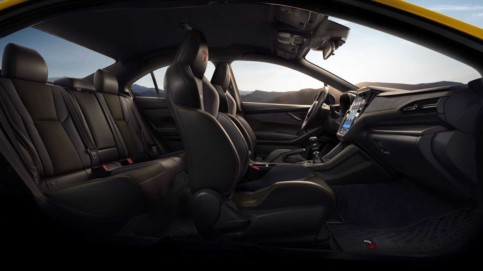 2026 Subaru WRX interior cutaway showing both the front and back seats from the passenger side. 