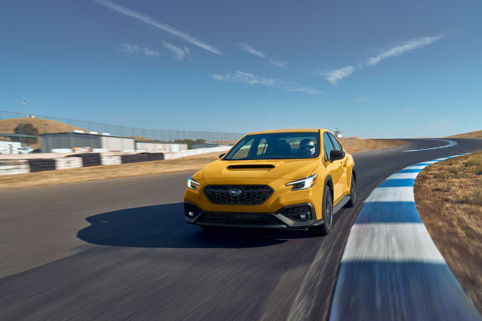 2026 Subaru WRX Series.Yellow on a race track