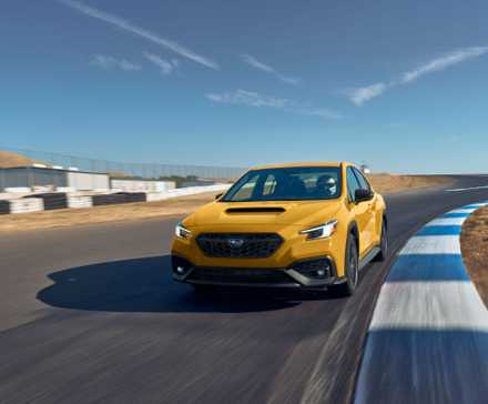 2026 Subaru WRX Series Yellow on a race track.
