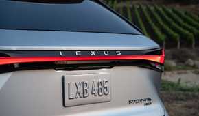 Close-up shot of the rear end of a silver 2026 Lexus RX 350h.