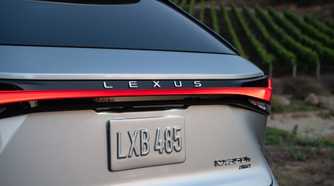 Close-up shot of the rear end of a silver 2026 Lexus RX 350h.