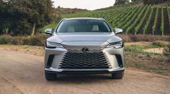 Static front-end shot of a silver 2026 Lexus RX 350h.