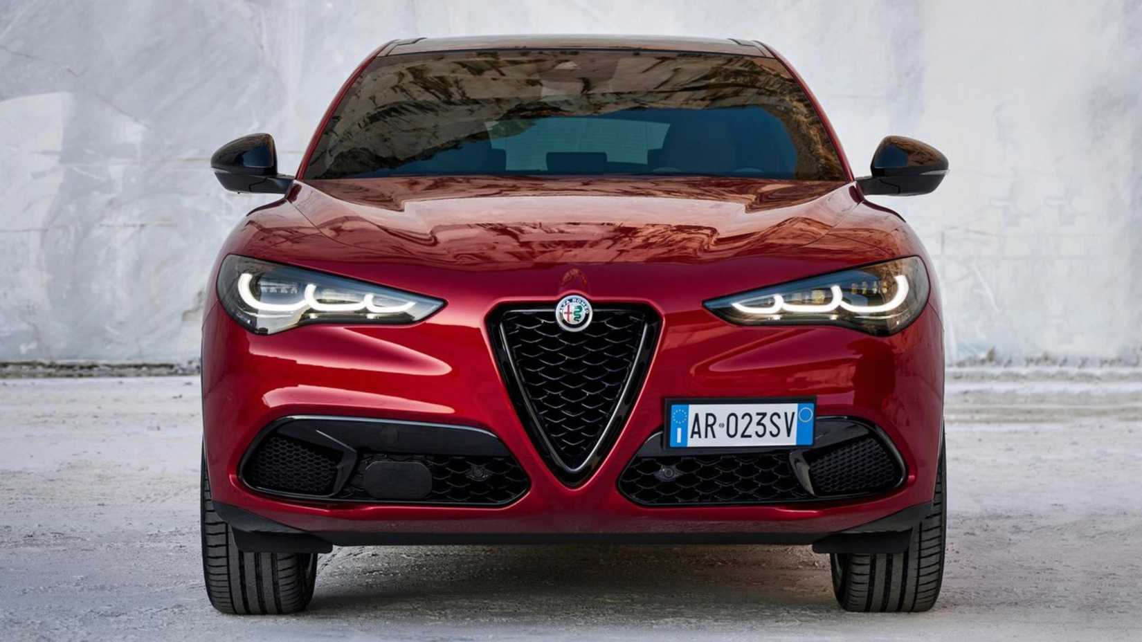 Static photo of the front of a red 2023 Alfa Romeo Stelvio.