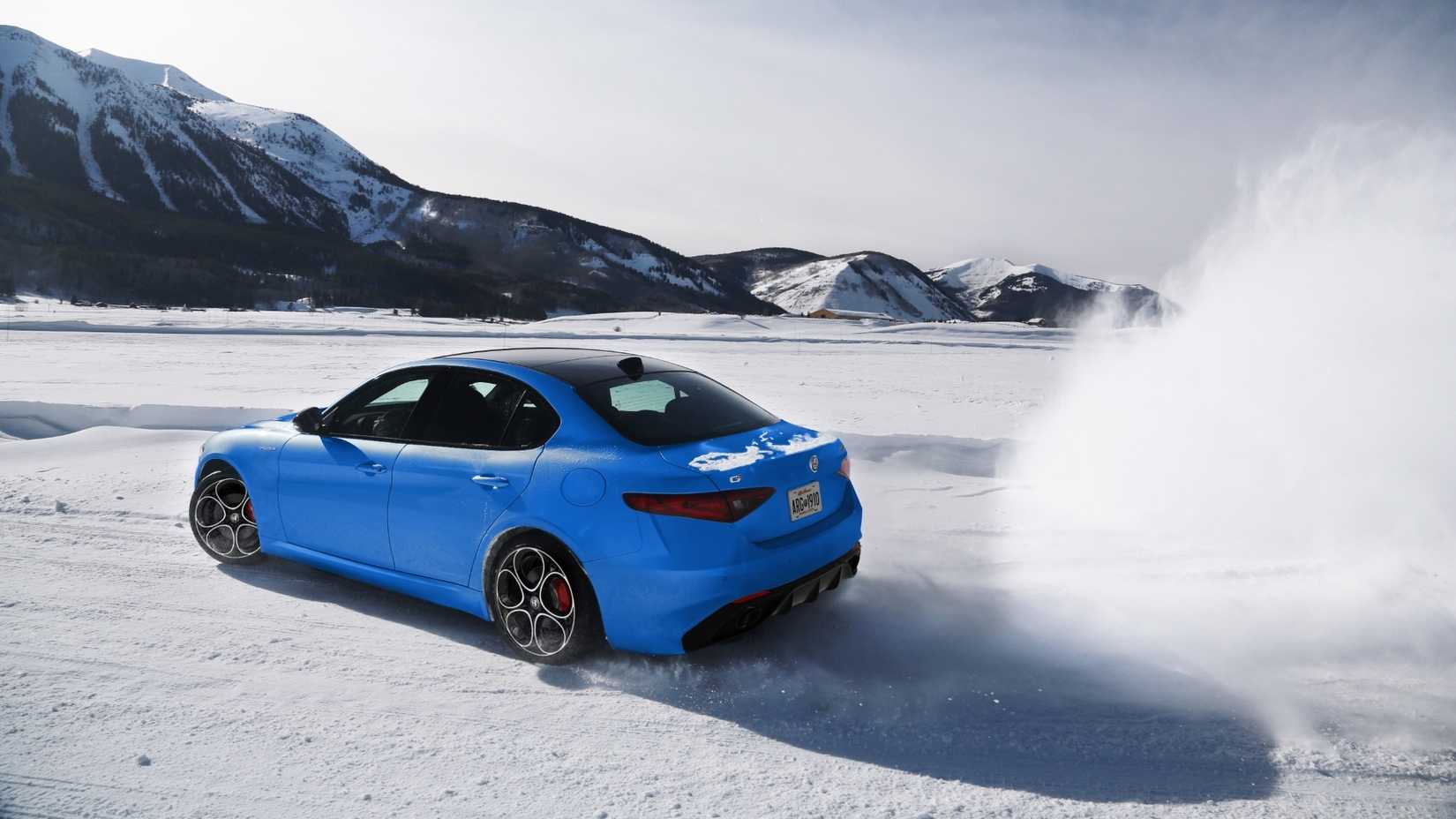 Rear 3/4 action shot of a 2023 Alfa Romeo Giulia