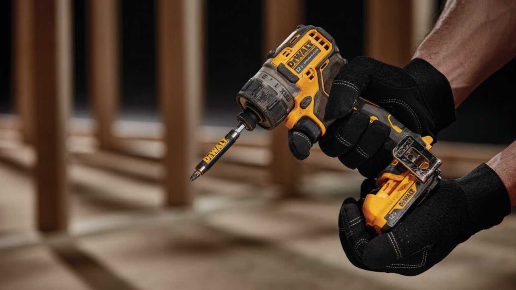 Person holding a DeWALT 12v impact driver
