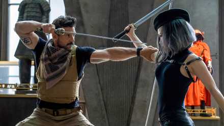 Frank Grillo and Selina Lo fight with swords in Boss Level.