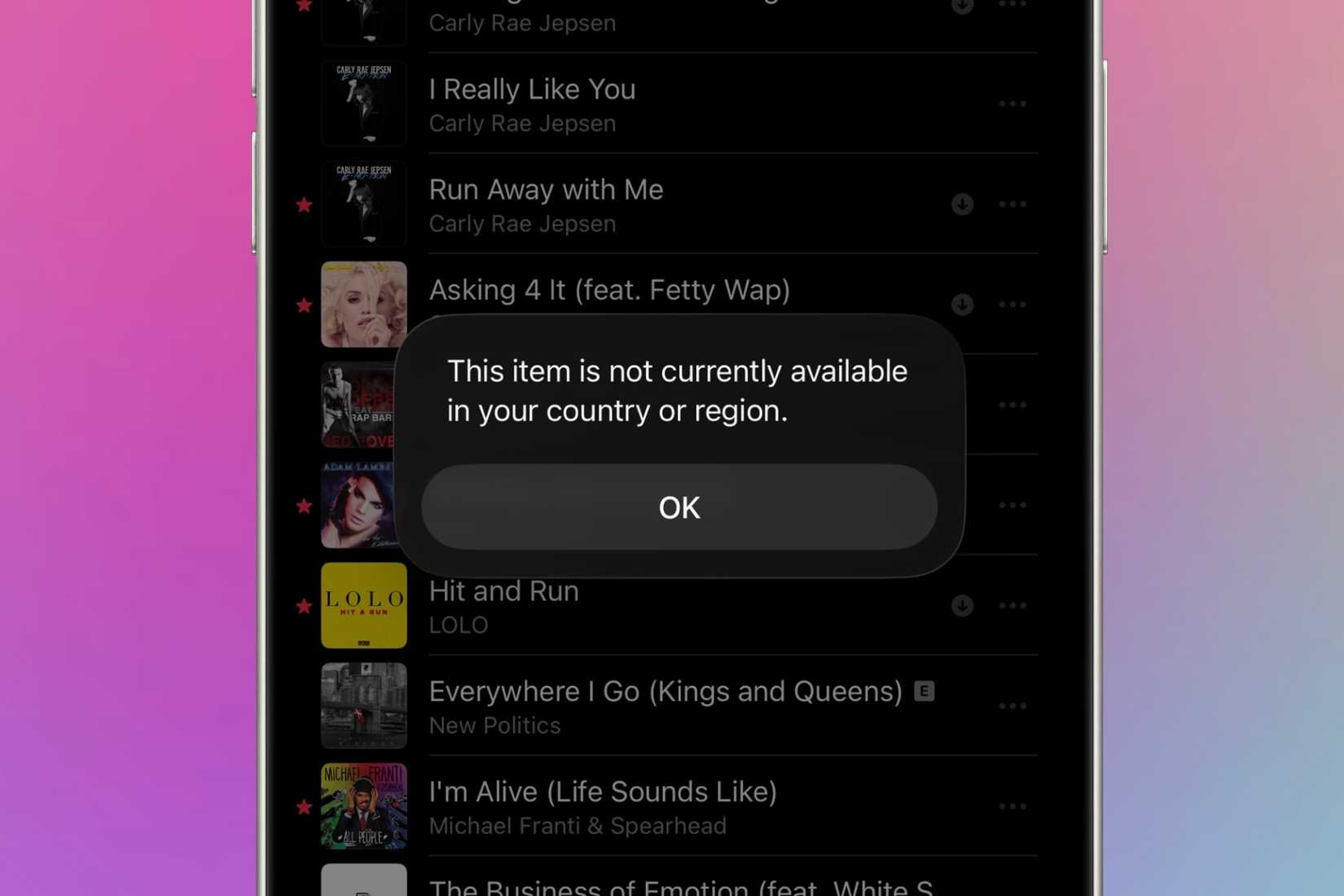 Song not available on Apple Music and displaying a message from it on an iPhone in front of a colored background.
