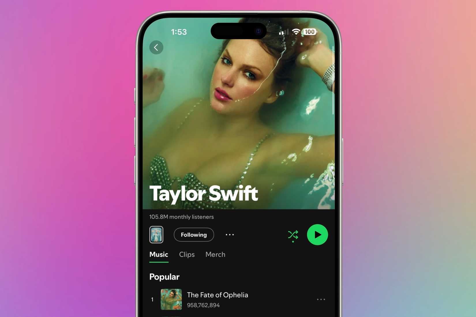 Taylor Swift's Spotify profile on an iPhone in front of a colorful background.