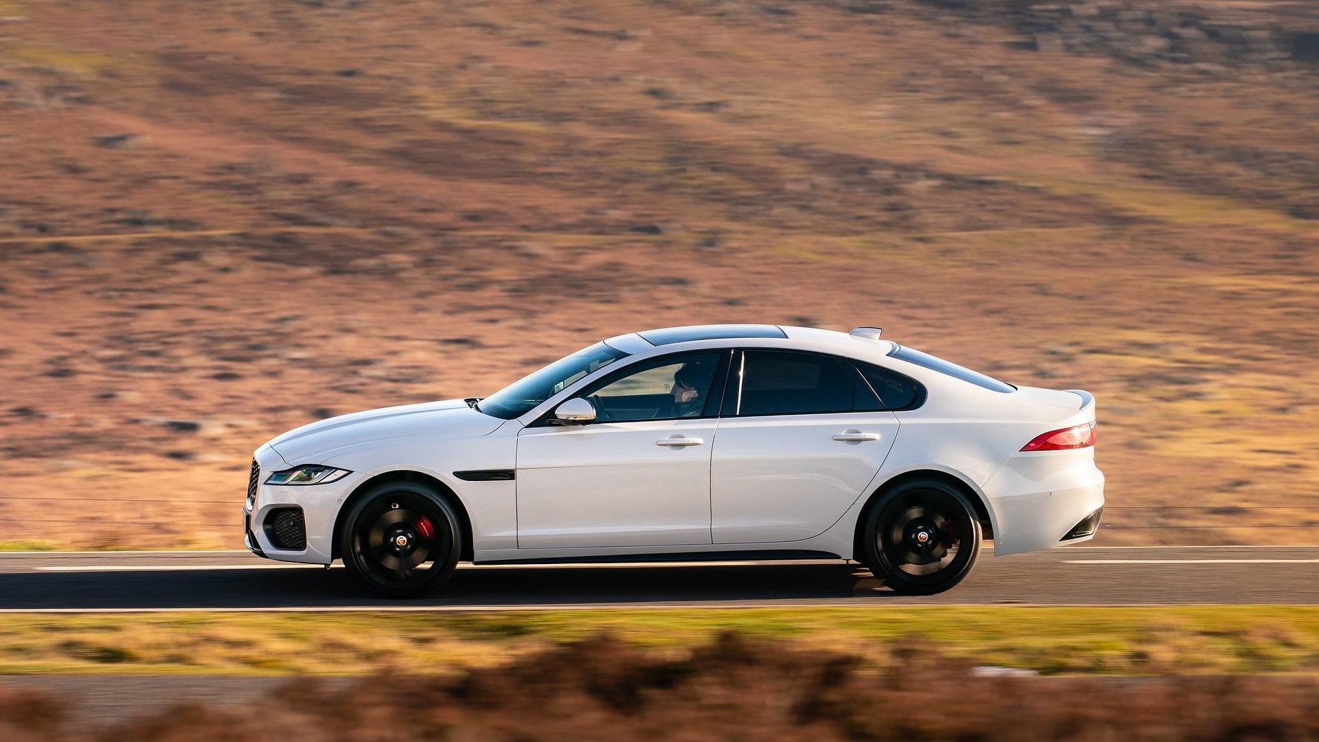 Side profile view of a 2021 Jaguar XF