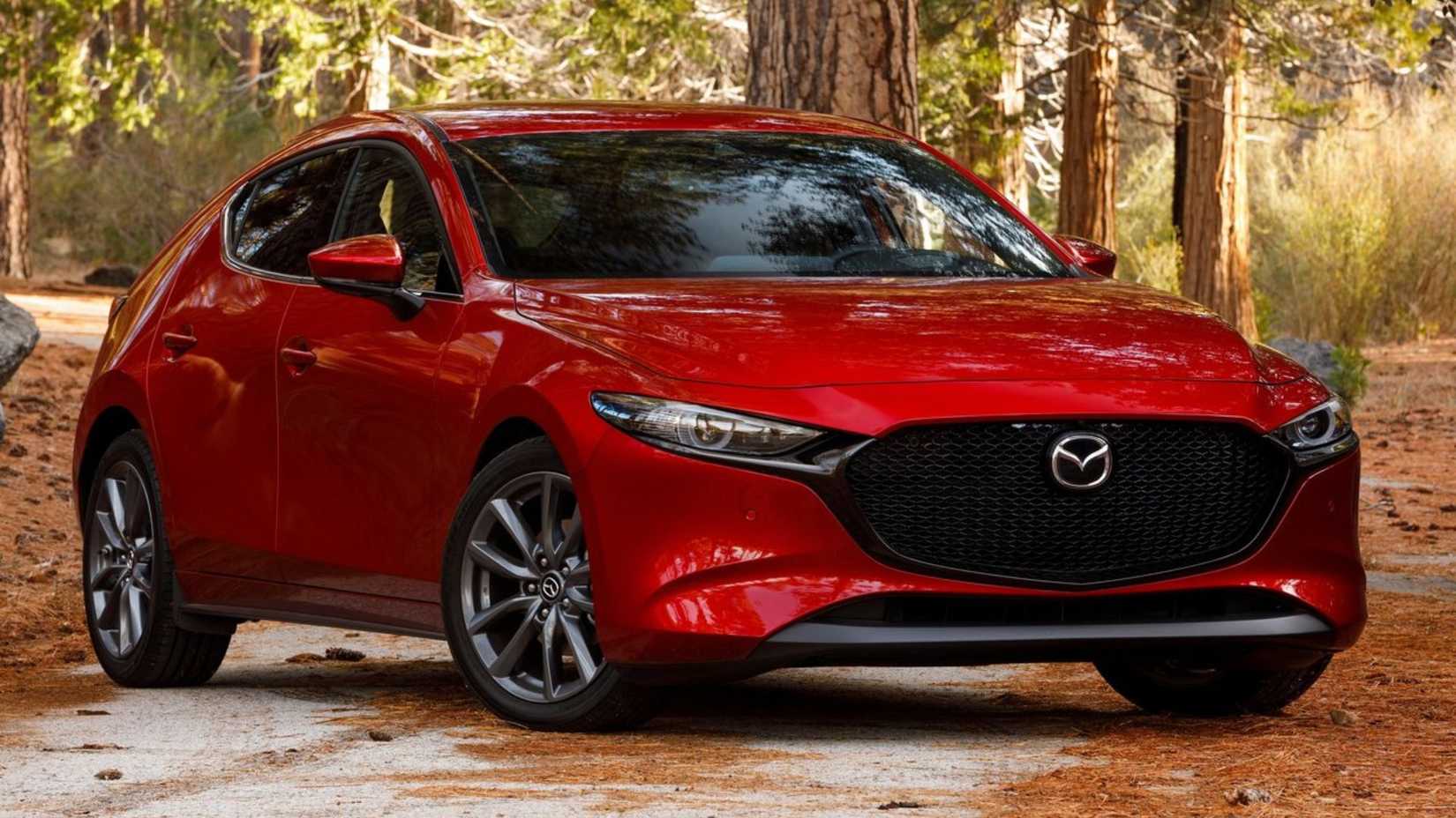 Static front 3/4 shot of a red 2019 Mazda3.