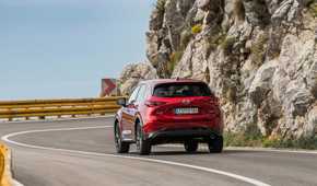 Rear 3/4 action shot of 2023 Mazda CX-5