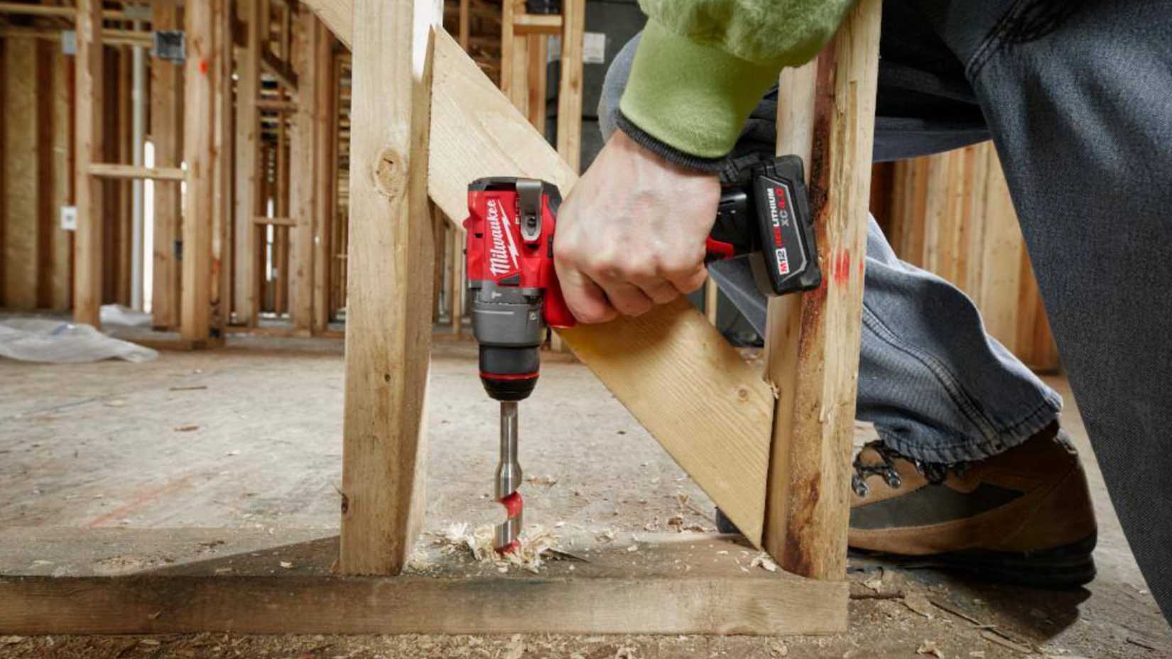 Person using the Milwaukee M12 drill