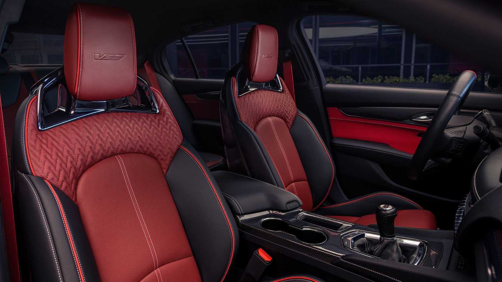 Shot of the red and black leather interior inisde the cabin of a 2026 Cadillac CT5-V Blackwing Curated by Cadillac.