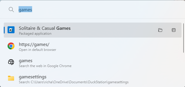 A screenshot of Windows 11 with PowerToys Run command palette open and games is being searched.