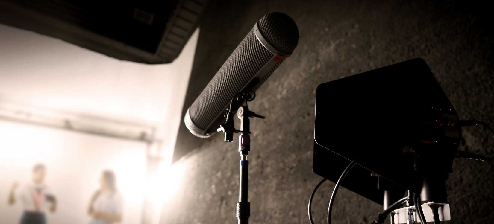 A boom mic on a movie set.