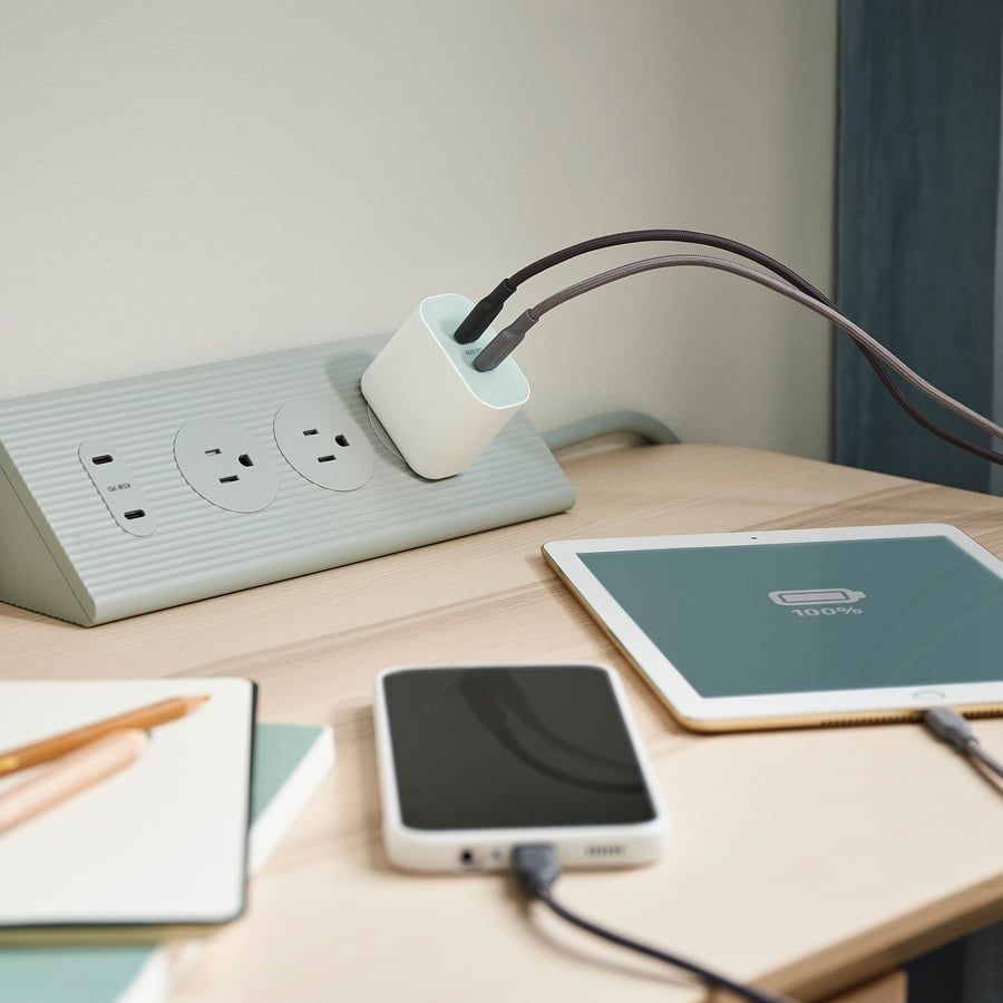 Phone and tablet plugged into a SJu00d6SS 45w charger.