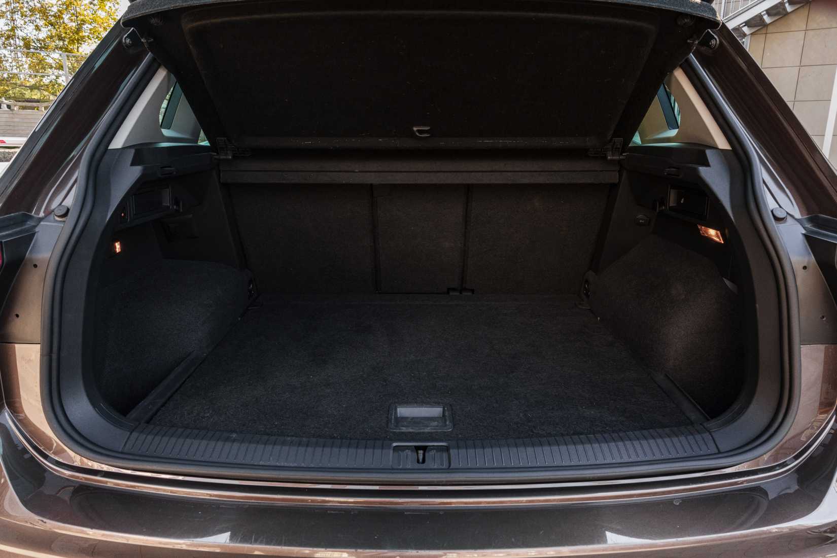 Photo of a newer SUV with an empty rear cargo area.