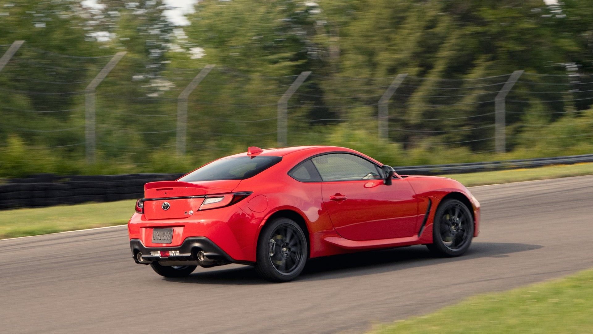Rear 3/4 action shot of a 2022 Toyota GR86