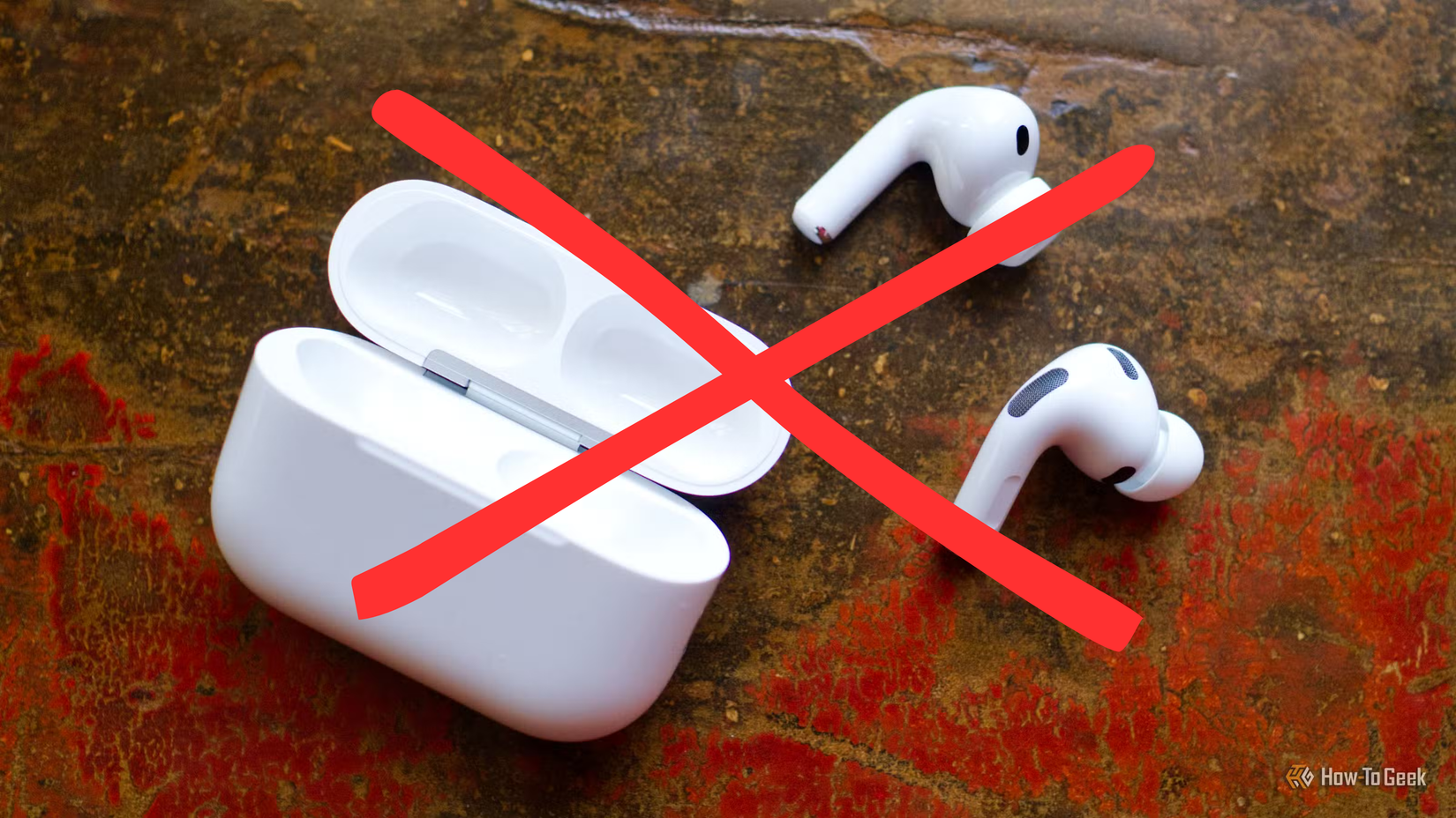 Crossed out Apple AirPods 3 Pro on a table.
