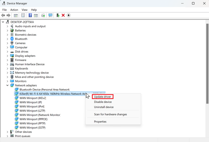 A screenshot of Windows 11 open to the device manager, the Wi-Fi adapter context menu is open and Update drivers is highlighted in red.