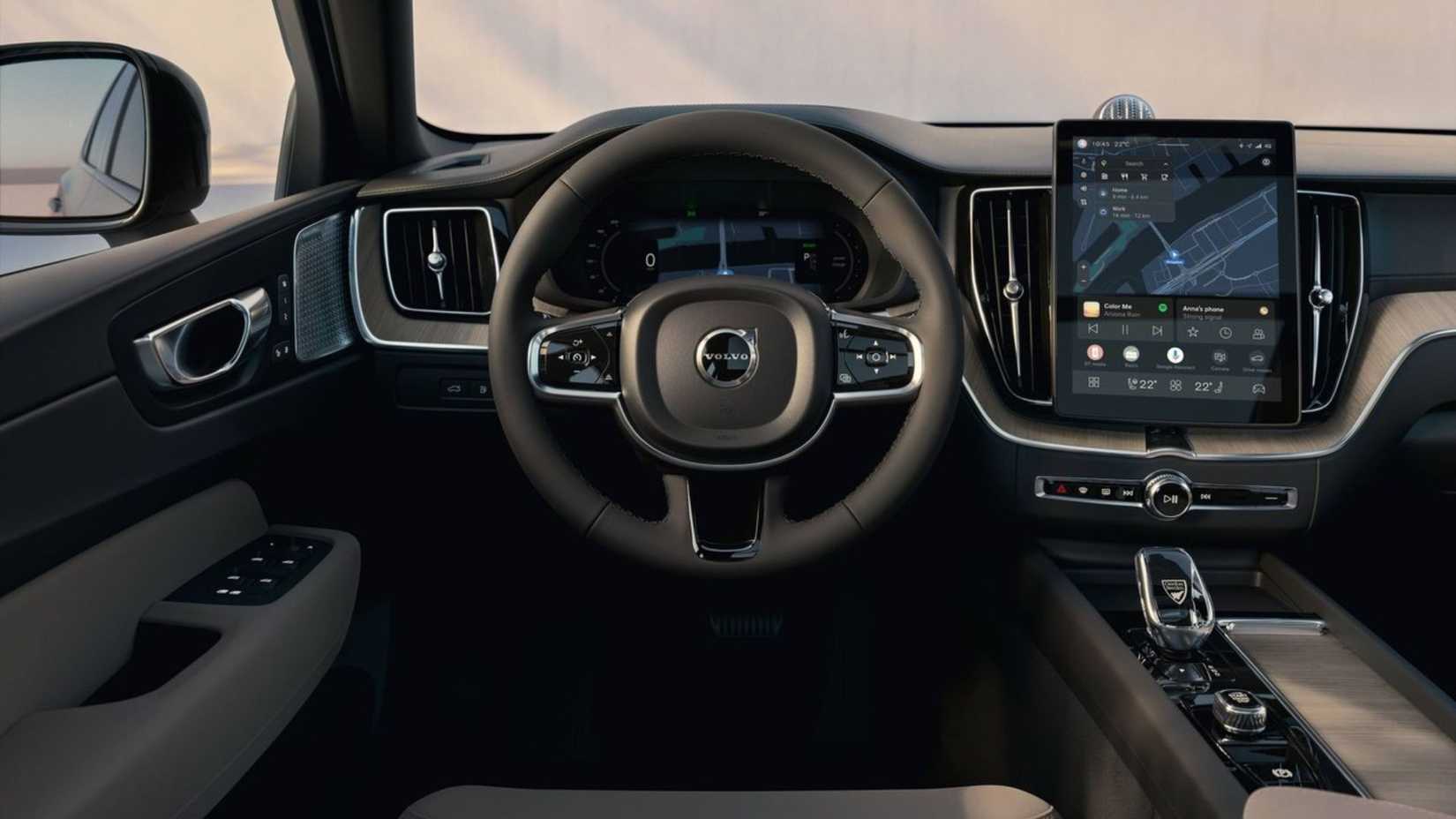 Shot of the steering wheel and dashboard inside the cabin of a 2026 Volvo XC60.