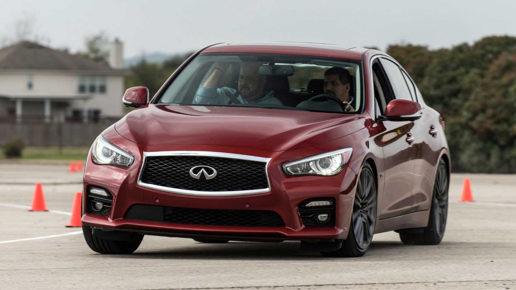 Dynamic front 3/4 shot of a red 2016 Infiniti Q50 Red Sport 400.