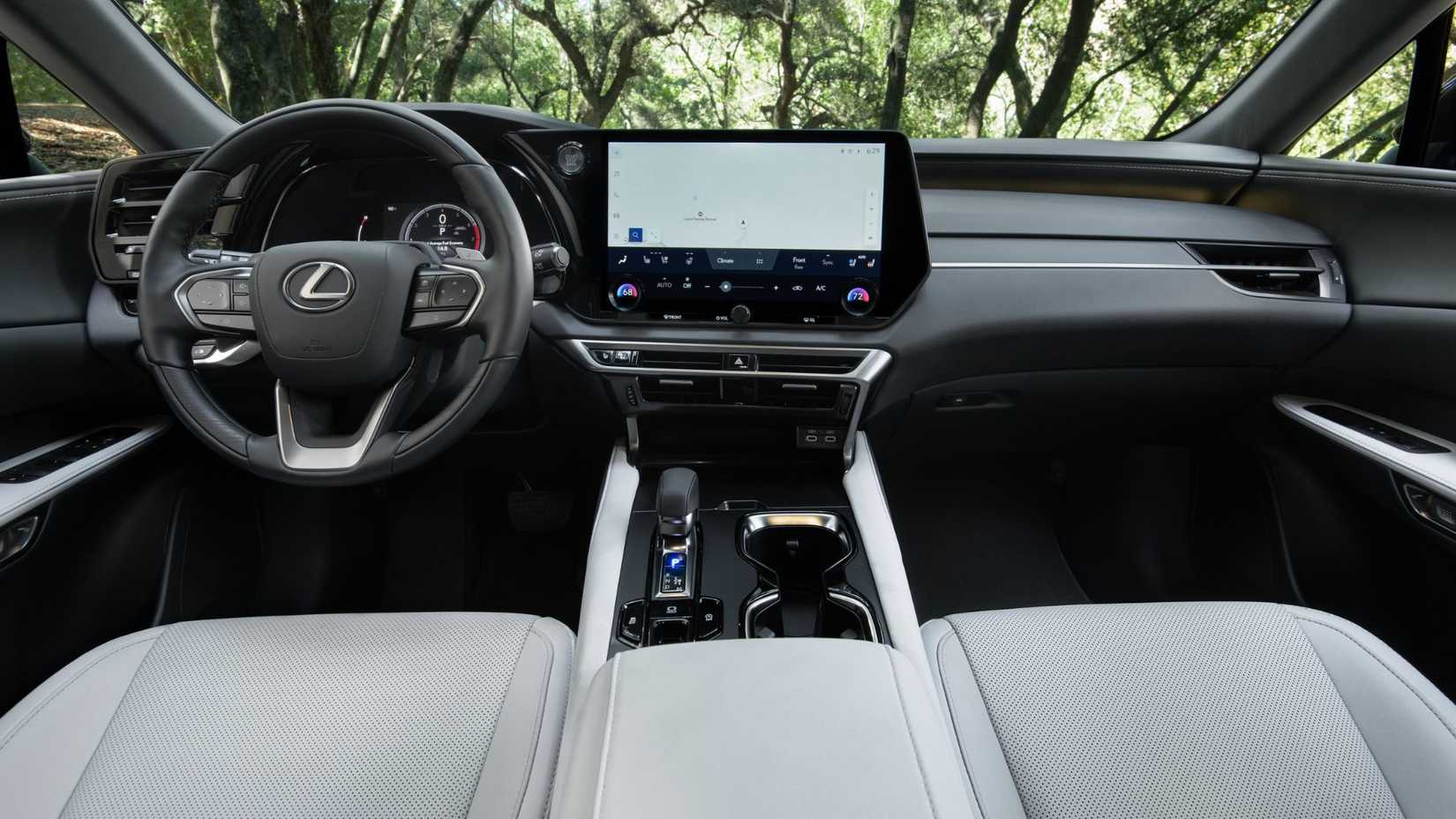 Shot of the dashboard and frotn seats in the cabin of a 2026 Lexus RX 350 Premium.
