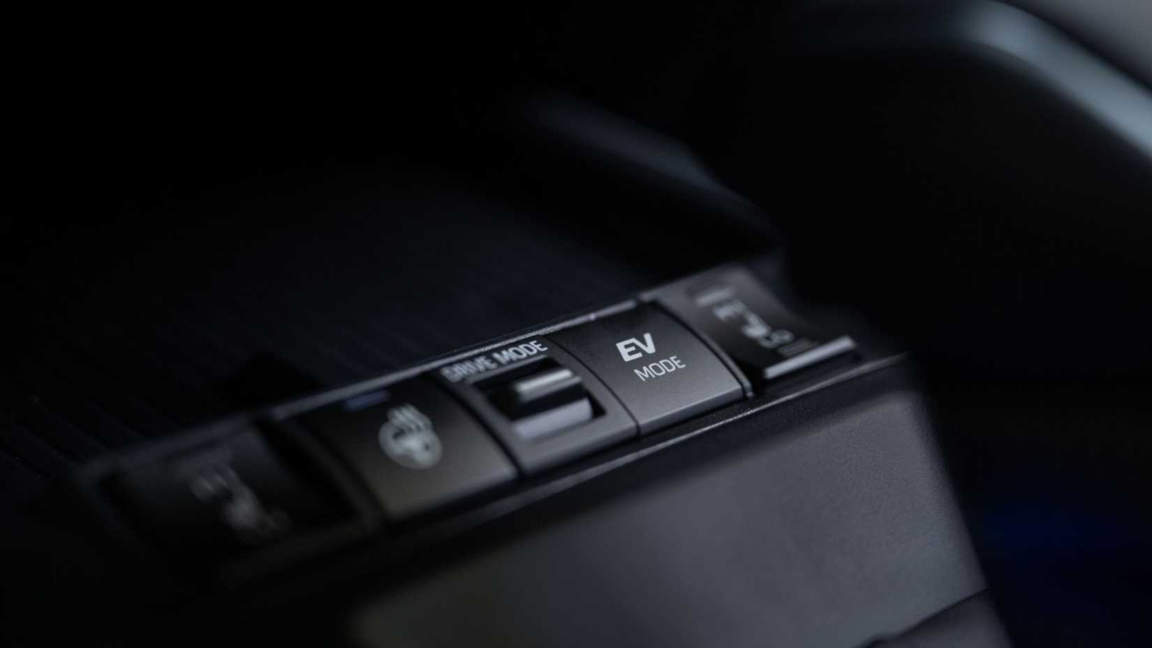Close-up shot of the driver controls in a 2026 Toyota Corolla Cross Hybrid XSE AWD.