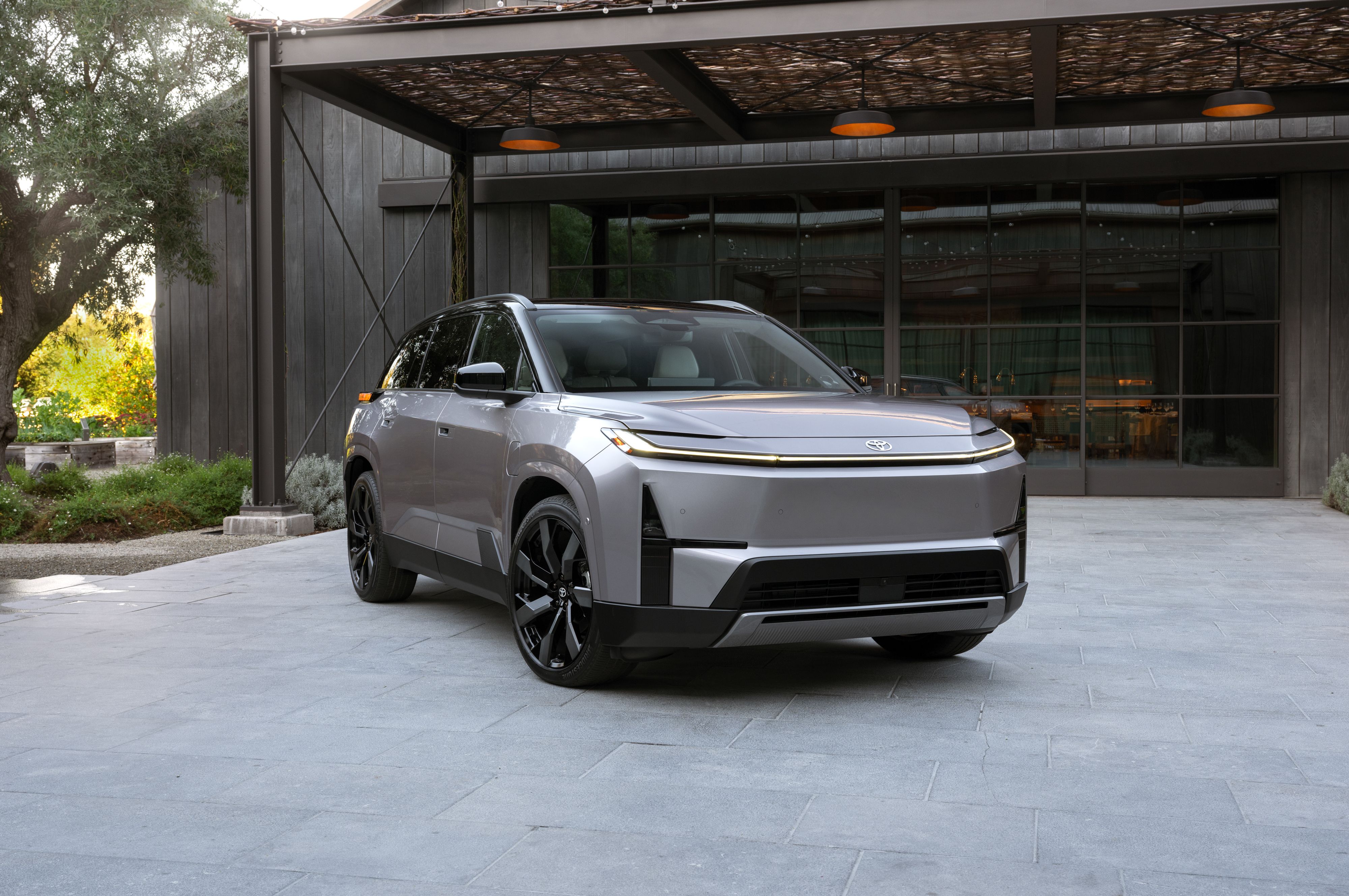 2027 Toyota Highlander EV revealed: 18 cupholders and Tesla-style charging