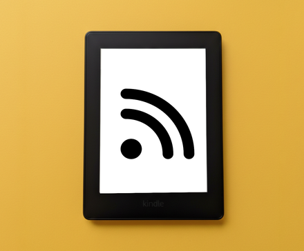a-kindle-paperwhite-showing-a-chessboard-on-a-yellow-backdrop.